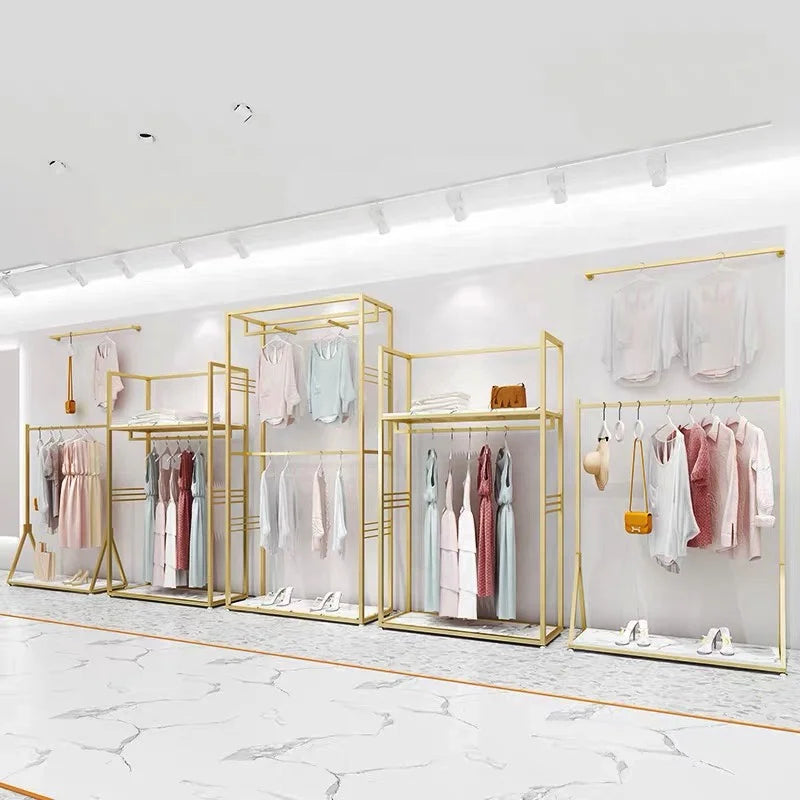 Wholesale Boutique Clothing Stand Golden Stainless Steel Clothing Shelving Rack Luxury Clothing Wall Racks for Garment Shop