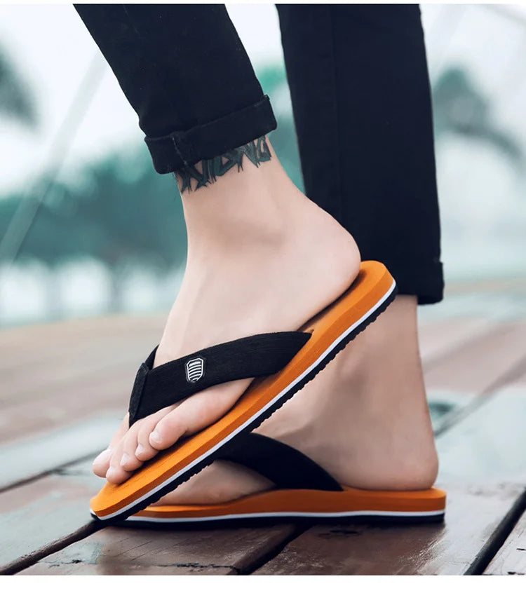 Factory wholesale summer men's beach shoes flip-flops leisure trend sandals wholesale pinch feet non-slip foreign trade explosions