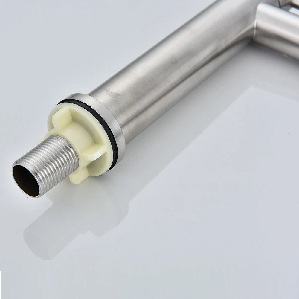 A stainless steel washbasin faucet. Single cold water, 1/2 inch public bathroom. Bathroom balcony